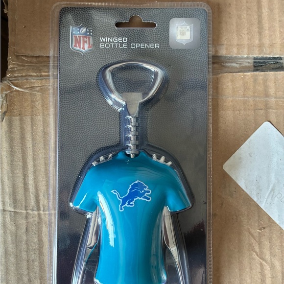 NFL Other - NFL Winged Lions Jersey Bottle Opener